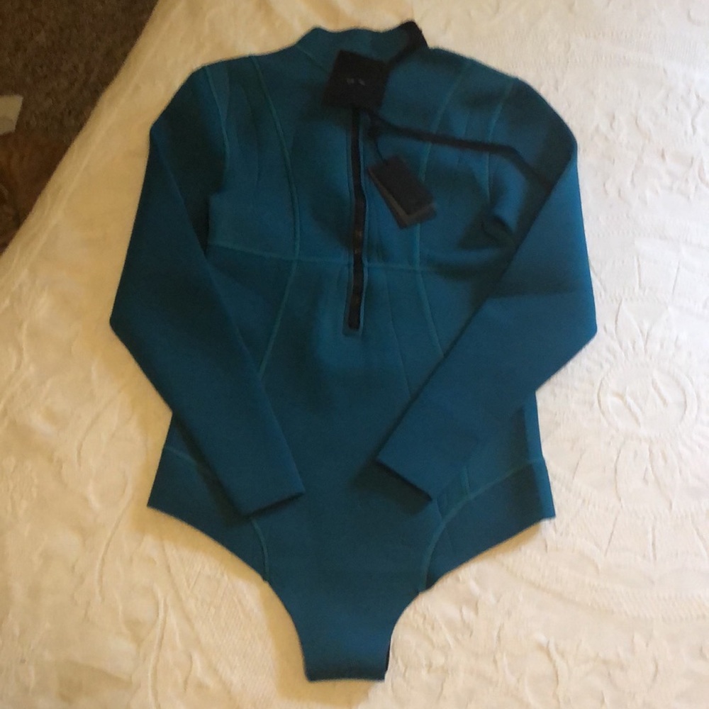 COPY - New with Tag 
90% Neoprene 10% Nylon
Color Teal

 Green/ blue